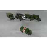 A Collection of Five Unboxed Military Dinky Toys to include Ambulance, 2x 3 Ton Wagons Etc