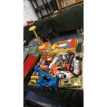 A Collection of Various Toys to include Die-Cast Vehicles, Building Blocks, Fisher Price Jack-In -