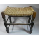 A Mid 20th Century Oak Framed Rush Topped Stool, 54.5cm Wide