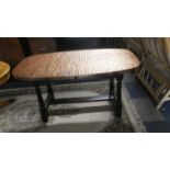 A Hammered Copper Topped Coffee Table, 91cm Wide