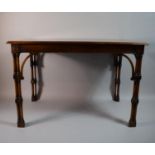 A Reproduction Rectangular Mahogany Occasional Table with Turned Spindle Supports, 69cm Wide