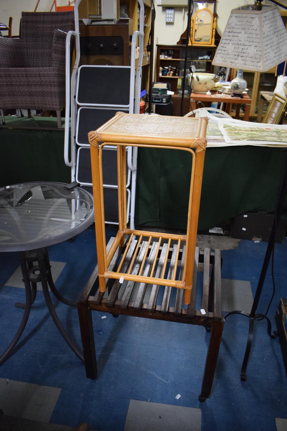 A Suitcase Stand and a Bamboo Occasional Table