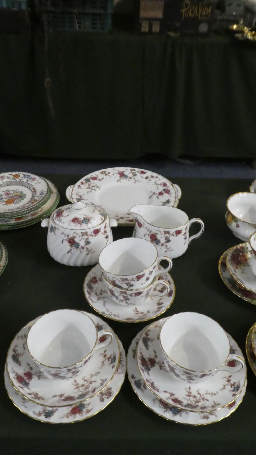 A Collection Minton Ancestral Pattern Teawares to Include Four Cups, Three Saucers, Two Bread and