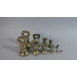 A Collection of Eleven Various Brass Bell Weights