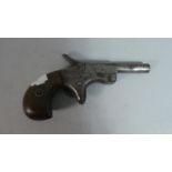 A 19th Century Ladies Muff Pistol