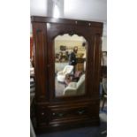 A Late Victorian Mahogany Mirror Fronted Wardrobe with Base Drawer, 129cm wide