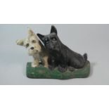 A Vintage Cast Metal Black and White Whisky Door Stop, 21cm Wide