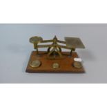 An Edwardian Set of Brass Postage Scales and Weights on Wooden Rectangular Plinth, 17.5cm Wide