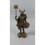 A Heavy Brass Model of a Viking Warrior Holding Axe Aloft, 28cm High