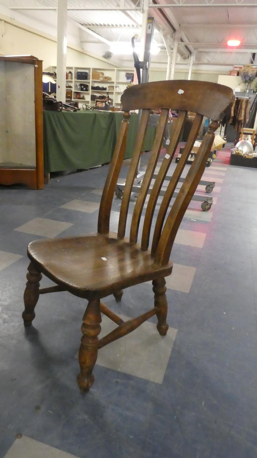 A Cut Down Elm Seated 19th Century Kitchen Chair