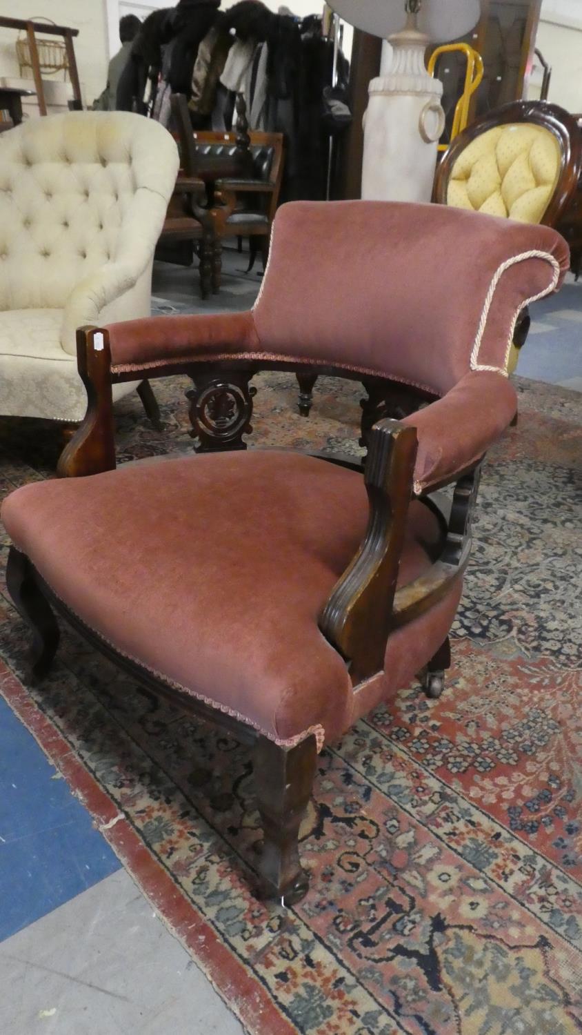 A Late 19th/Early 20th Century Ladies Tub Nursing Chair on Short Cabriole Supports