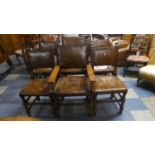 A Set of Six Edwardian Oak Framed Leather Upholstered Dining Chairs