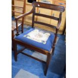 A 19th Century Mahogany Framed Ladder Back Armchair with tapestry Seat