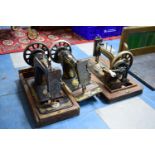 A Collection of Three Vintage Sewing Machines to Include Hexagon, Frister & Rossmann and Singer