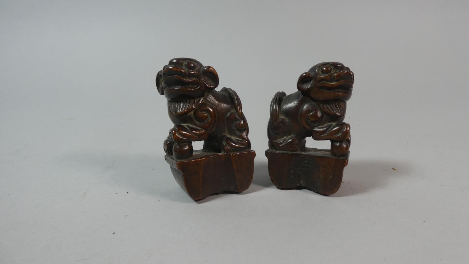 A Pair 19th Century of Oriental Wooden Carvings in the Form of Foo Dogs, Possibly Furniture Mounts/