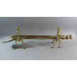 A Brass Three Piece Long Handled Set of Fire Irons and Pair of Dogs