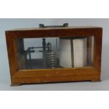 A Mid 20th Century Cased Barograph with Spare Charts, 28cm Wide