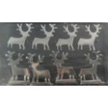 A Set of Eight Silver Plated Novelty Napkin Rings in the Form of Reindeer