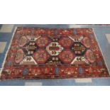 A Persian Hand Made Bakhtiari Rug. 220x120cms