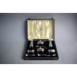 A Cased Six Piece Silver Cruet with Four Silver Spoons, Birmingham 1949