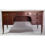 A Mahogany Writing Desk with Tooled Leather Top having Centre Long Drawer Flanked by Two Banks of
