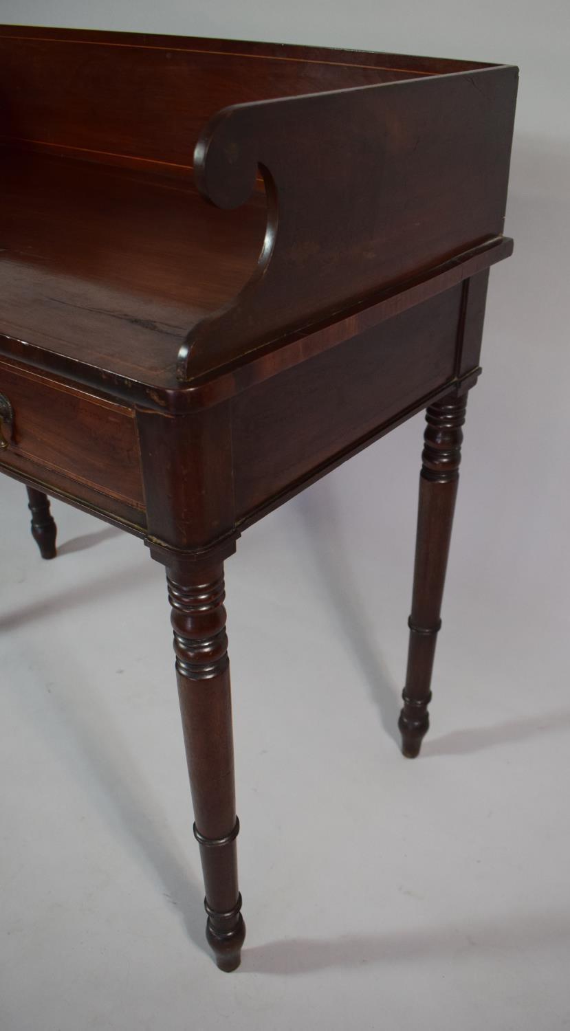 A 19th Century Mahogany Washstand with Carved Raised Gallery and Set on Turned Wooden Legs having - Image 4 of 5