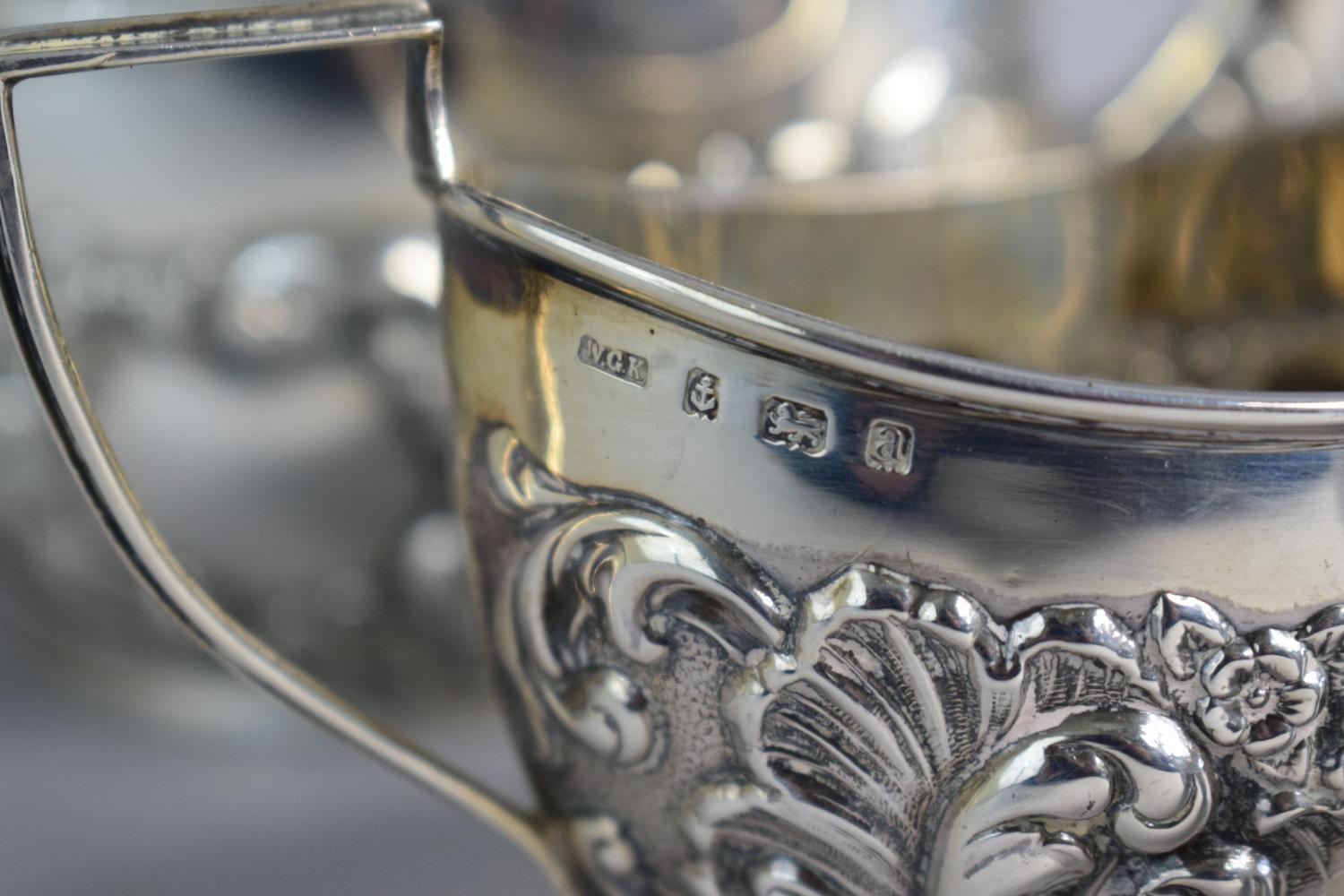 A Silver Three Piece Bachelor's Tea Service with Repousse Decoration, Birmingham 1900 - Image 2 of 3