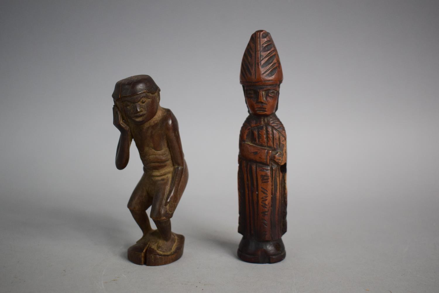 An Early Carved Continental Figure of a Bishop and a Carved Chinese Figure of a Coolie (Bishop
