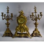 A Large French Brass Clock Garniture Having Eight Day Movement. Clock 54cm High. Four Branch