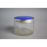 A Silver and Blue Enamelled Mounted Glass Cylindrical Dressing Table Pot, 6.25cm Diameter