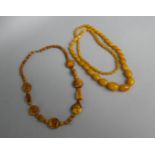 A Reconstituted Amber Necklace and a Faux 'Butterscotch' Amber Necklace