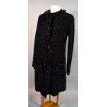 An Armani 3/4 Length Ladies Large Weave Black Coat