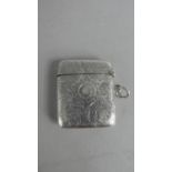 A Silver Vesta with Engraved and Monogrammed Decoration. Chester 1907