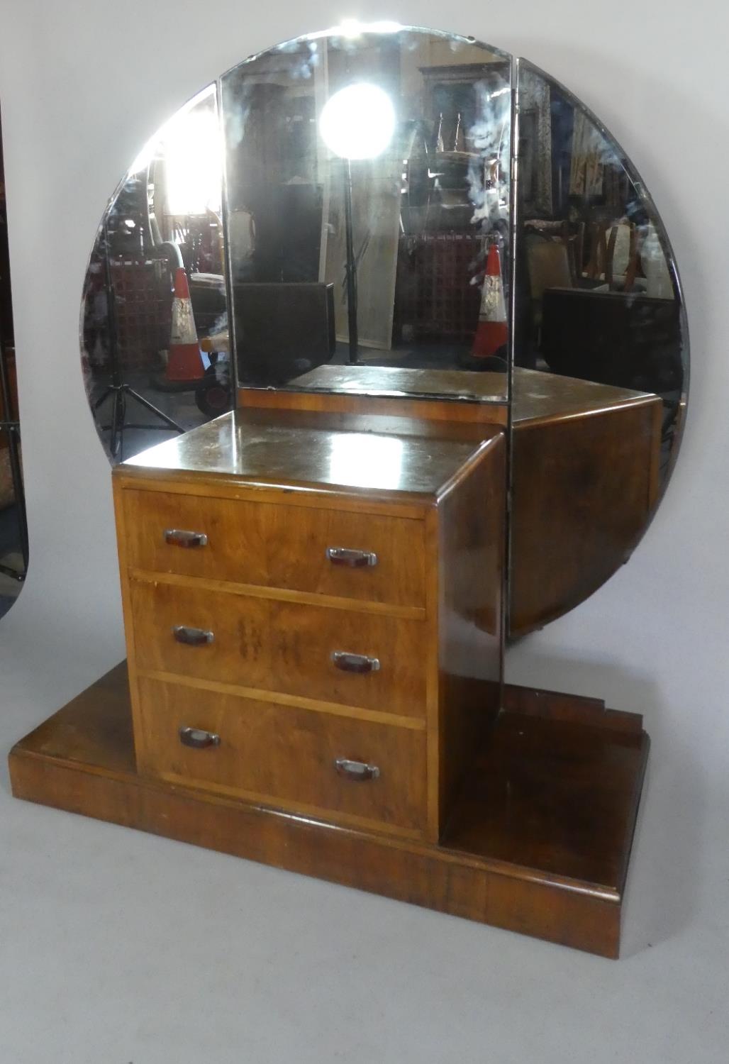 An Art Deco Bedroom Dressing Chest with Three Centre Drawers and Plinth Base, Three Section Circular