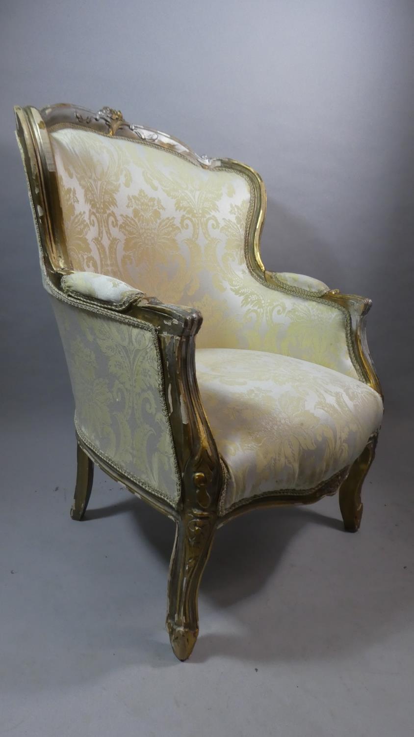 A 'Shabby Chic' French Style Salon Armchair with Gilt Frame