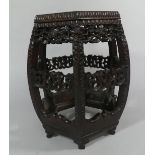 A Chinese Hardwood Vase Stand of Hexagonal Form with Inset Marble Top. Carved, Moulded and Pierced