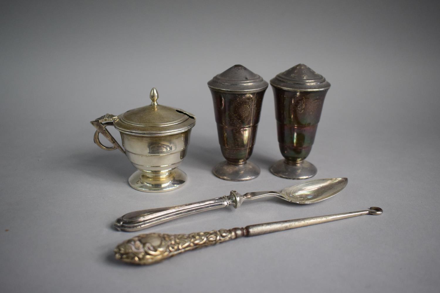 A Silver Three Piece Cruet, Silver Handled Button Hook and a Silver Teaspoon