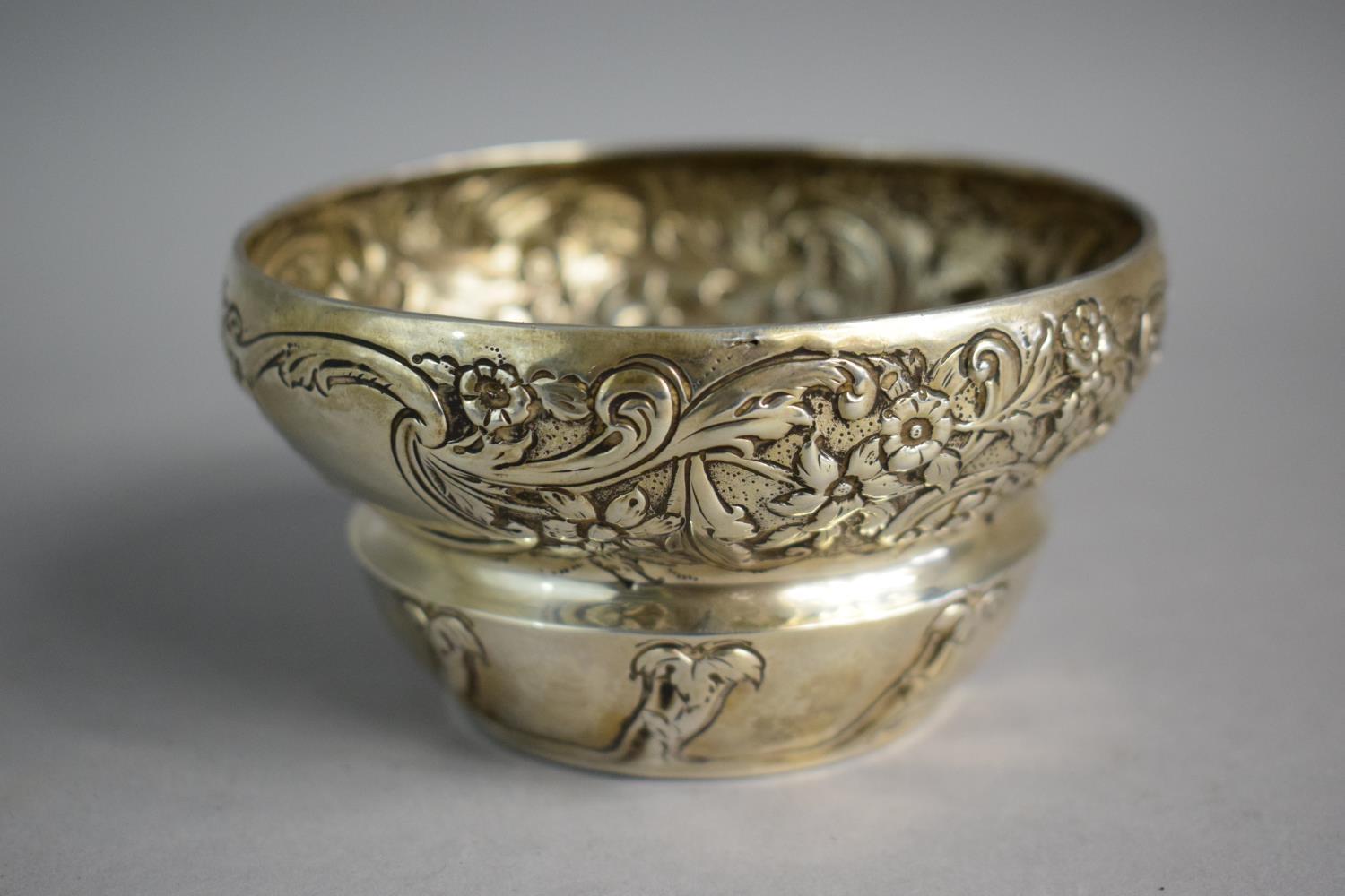 A Silver Sugar Bowl with Art Nouveau Repousse Decoration 11.5cm Diameter. London 1903