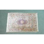 A Very Fine Silk Hereke Rug. 93x60