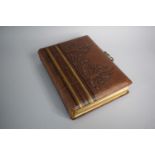 A Tooled Leather Bound Victorian Photograph Album Containing Photos of Welsh Family