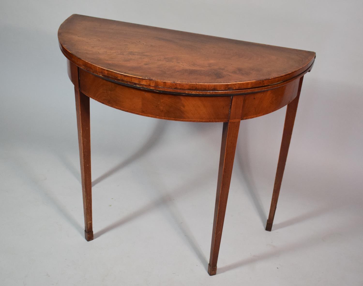 A Mahogany String Inlaid Georgian Games Table with Beize Top and Supported on Tapered Legs. 84cms - Image 2 of 5