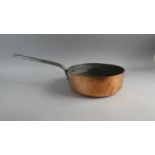 A Large and Heavy Victorian Copper Saucepan with Steel Handle. 26cms Diameter