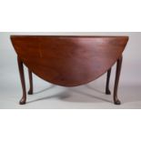 A 19th Century Mahogany Drop Leaf Table supported on Cabriole Legs having Pad Feet
