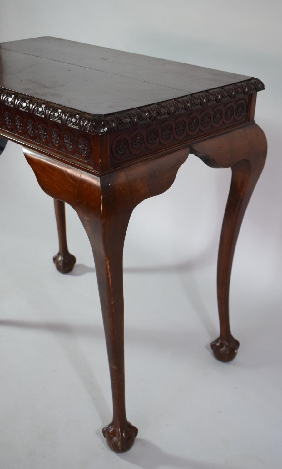 A Mahogany Silver Table with Carved Border set on Cabriole Legs culminating in Claw and Ball Feet, - Image 5 of 6