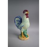 A Continental Majolica Rooster or Cockerel with Open Beak, 36.5cm high