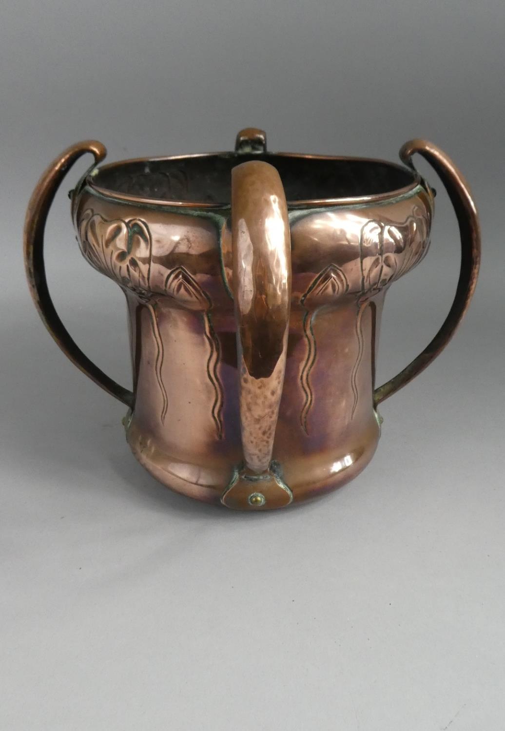 A William Soutter and Sons Arts and Crafts/Art Nouveau Hand Beaten Copper Planter with Four Stylised