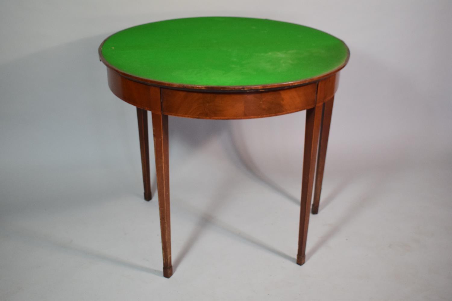 A Mahogany String Inlaid Georgian Games Table with Beize Top and Supported on Tapered Legs. 84cms - Image 4 of 5