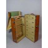 A Vintage Steamer or Cabin trunk/Portmanteau with Five Fitted Drawers and Hanging Compartment