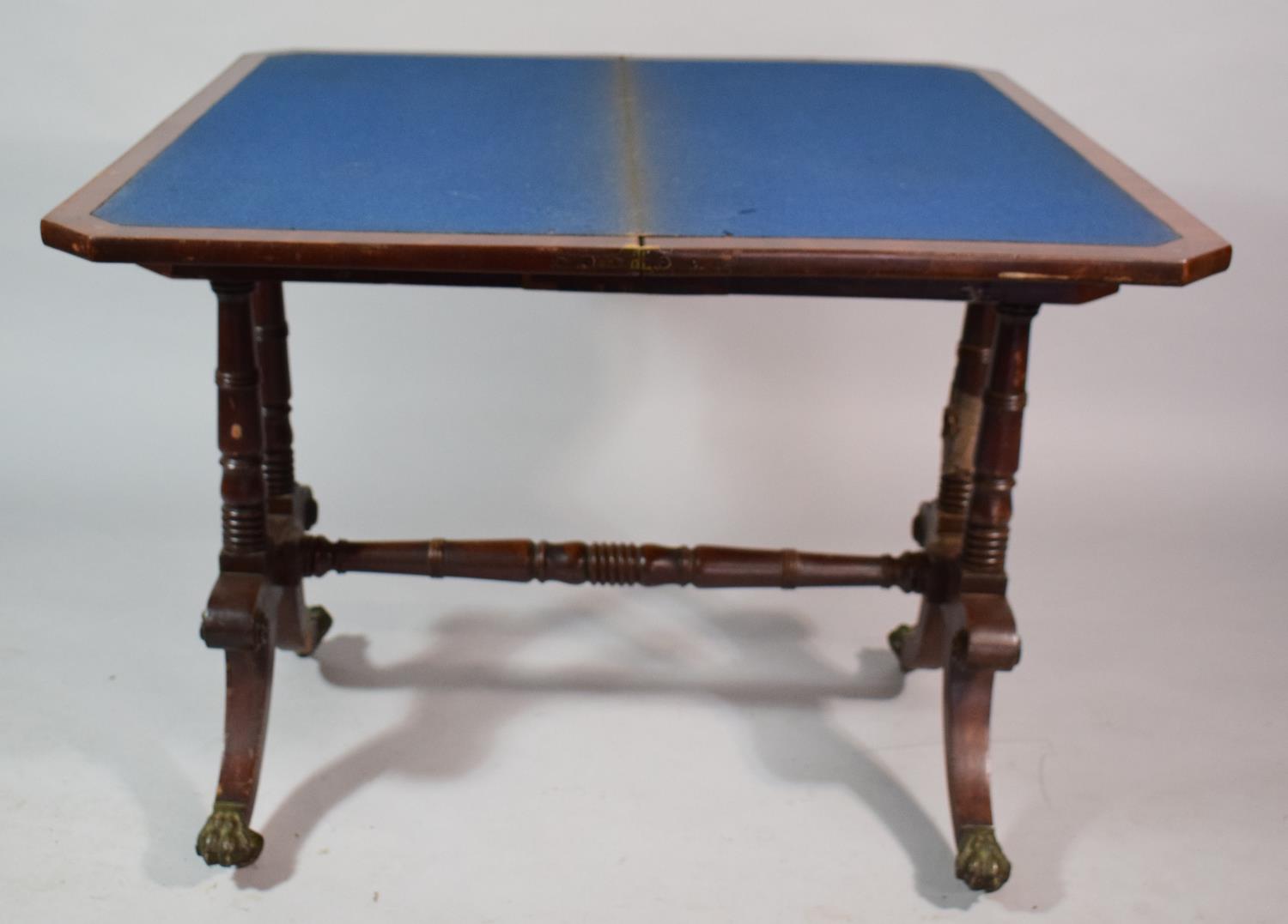 A Mid/Late 19th Century Mahogany Lift and Twist Games Table with Claw Feet and Castors. 89cms Wide - Image 3 of 3