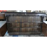 A 19th Century Oak Three Shelf Dresser Plate Rack with Pierced Cornice. 190cms Wide